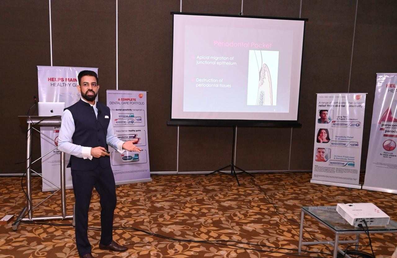 Dr. Gagan Jaiswal delivers a presentation at a award cermony, engaging the audience with his insights and expertise.