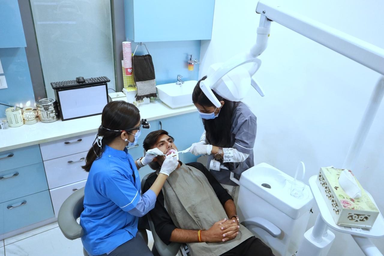 Dr. Shardha Jaiswal and her team member attends patient in a well-equipped Dental Clinic in Vijay Nagar, Indore